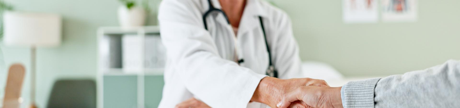 happy-woman-doctor-handshake-with-patient-consultation-agreement-checkup-hospital-female-person-medical-professional-shaking-hands-with-client-meeting-deal-appointment